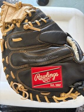 Rawlings Black and Tan Leather Baseball Catching Mitt with Red Logo Patch